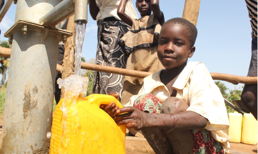 Kati-Kati-West-Child-enjoying-clean-water